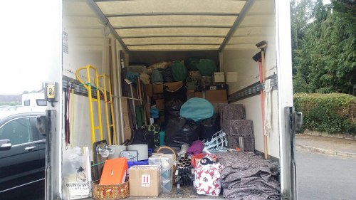 Construction site with waste materials ready for clearance in Merton