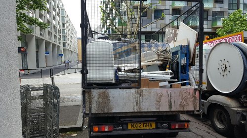 Workers managing construction waste clearance efficiently